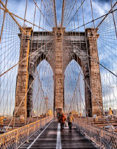 Walking over the Brooklyn Bridge.